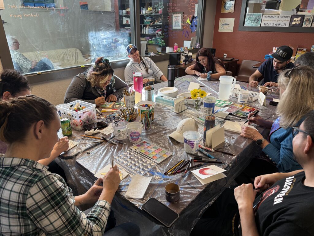 RCL community does a group art project as a School for Recovery class, building recovery capital.