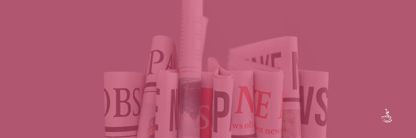 Stack of newspapers, representing Recovery Café Longmont being in the local news and press.